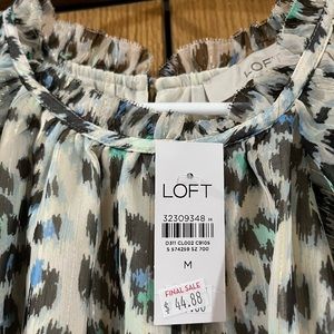 Loft size medium shimmery animal print blouse.